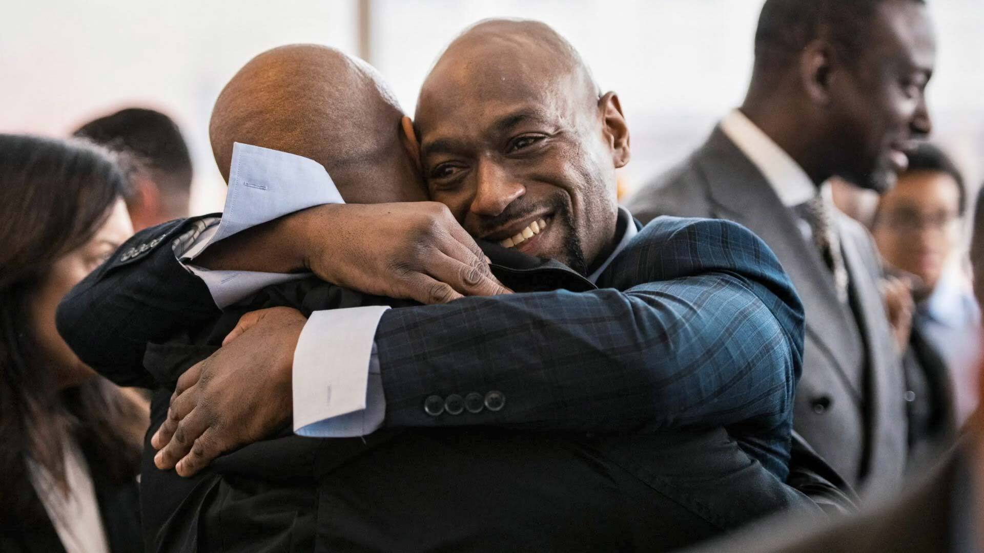 Huwe Burton hugging a loved one after his exoneration in 2019 in the Bronx, New York. (Image: Sameer Abdel-Khalek/Innocence Project)