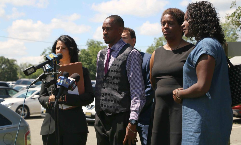 Dion Harrell at post-exoneration press conference with his attorney Vanessa Potkin and family members.(Photo by Yili Liu)