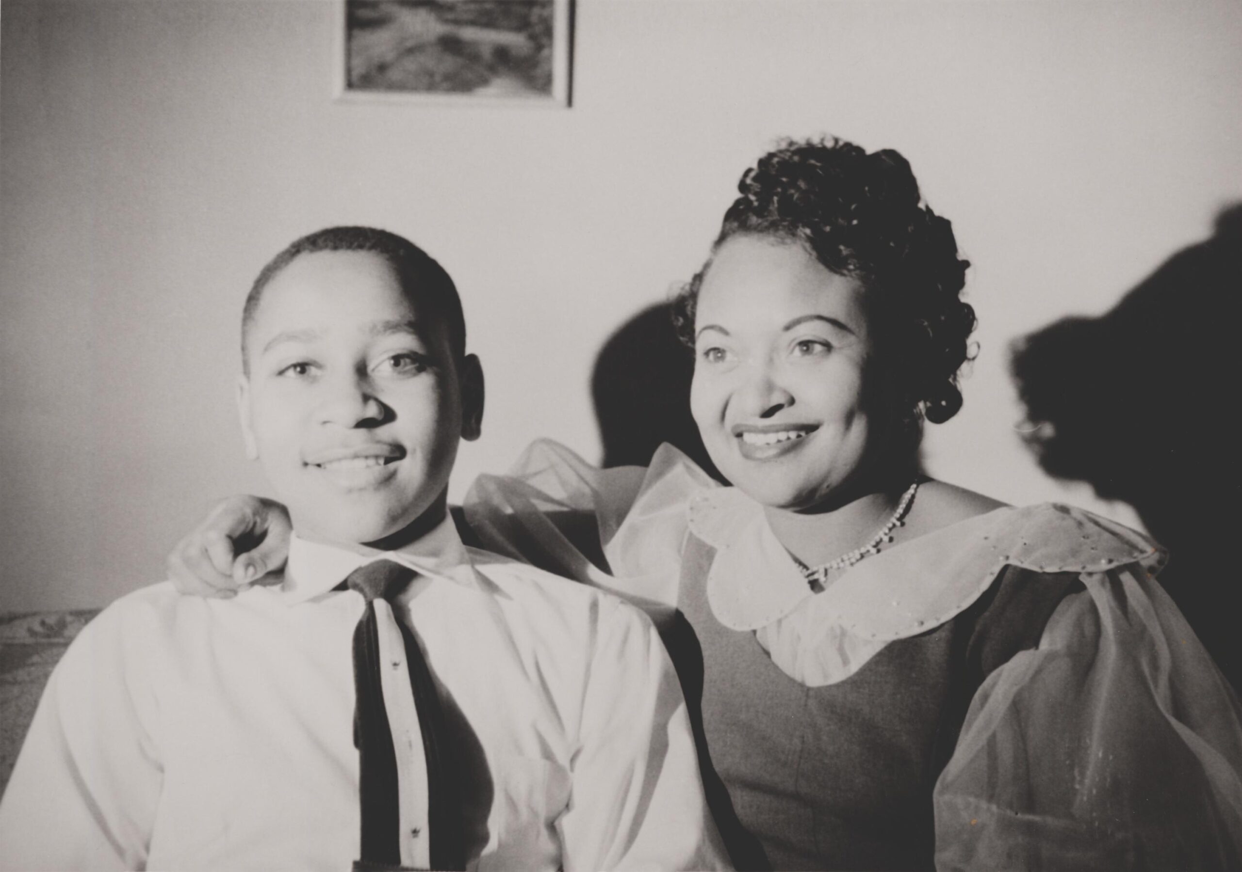 Emmett Till with his mother, Mamie Bradley, ca. 1950. To expose the horror of her 14 year-old's lynching, she ordered an open coffin funeral to show his tortured and mutilated body. (Image: Everett Collection Historical / Alamy)
