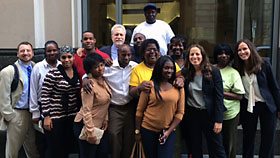 Friends, family and attorneys of Anthony Wright celebrate the dismissal of his conviction.
