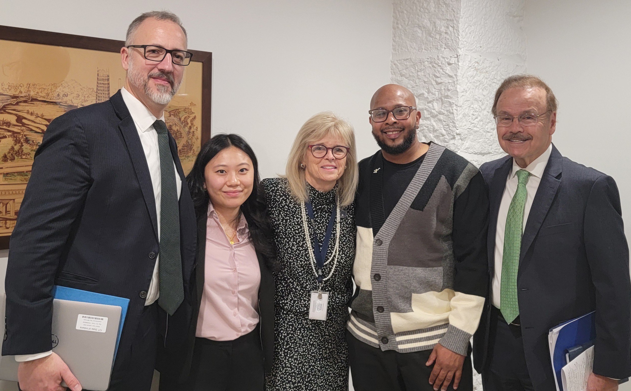 Indiana Public Defender Council's Zachary Stock, Innocence Project's Winnie Ye, Indiana Senator Liz Brown, exoneree Leon Benson, and Notre Dame Exoneration Justice Clinic's Jimmy Gurulé at a senate committee hearing in February 2025. (Image: Courtesy Leon Benson)