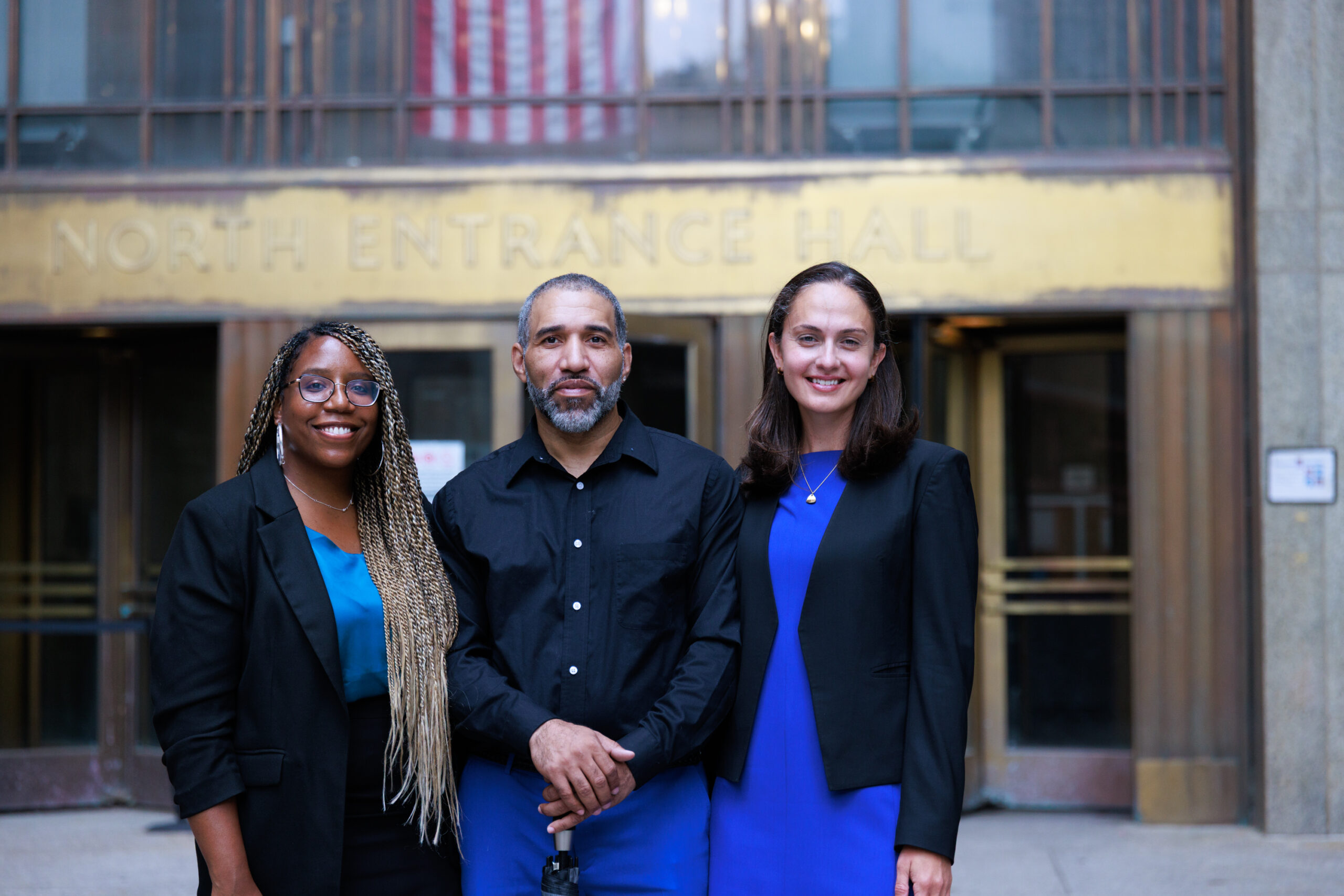 Brian Boles, joined by Foderaro Post-conviction Litigation Fellow Shabel Castro and Senior Staff Attorney Jane Pucher, is exonerated in New York on July 10, 2025. (Image: Nick Castle/Innocence Project)